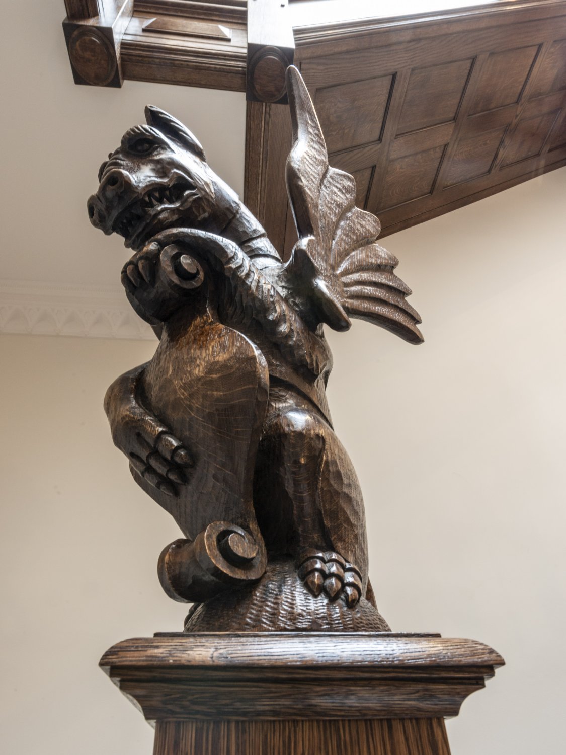 Hand carved mythical dragon staircase finial, in solid oak